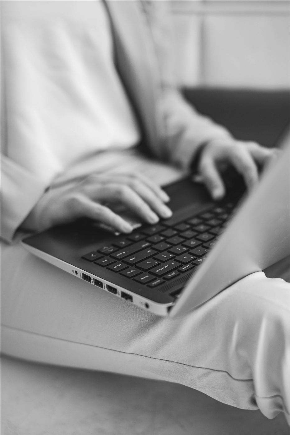 Hannah working at her laptop
